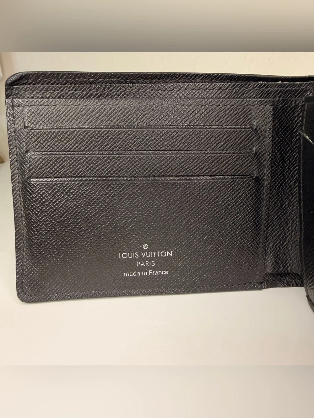 Authentic Louis Vuitton Black Epi Leather Bi-Fold Wallet
